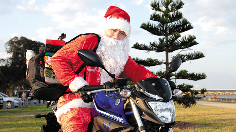 Santa Claus  is Riding into Town